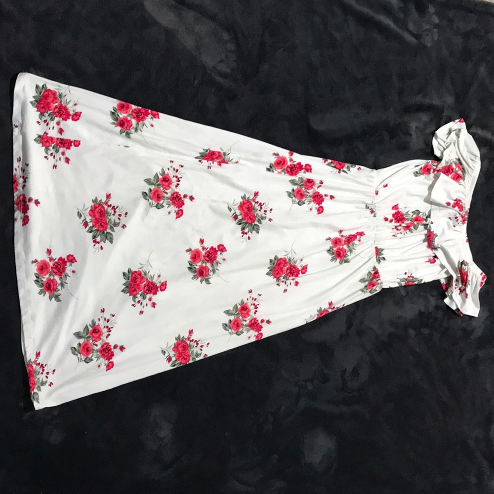 White dress with pink flowers.